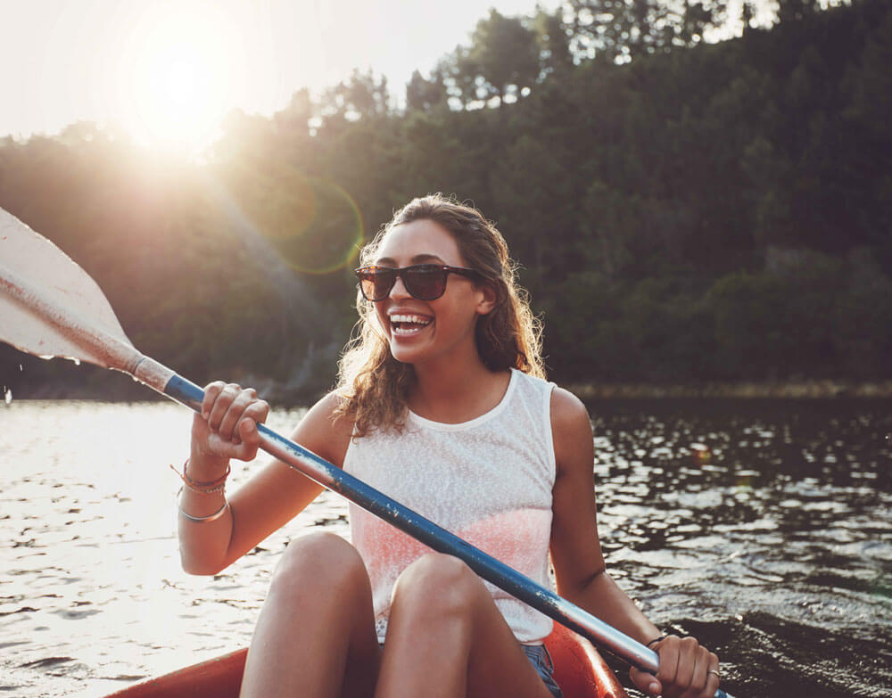 UA student kayaking on Lake Tamaha